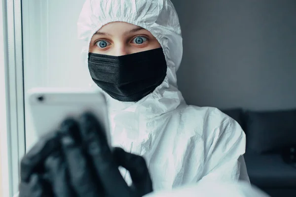 Woman Viral Protective Suit Face Mask Looks Fear Camera Hold — Stock Photo, Image