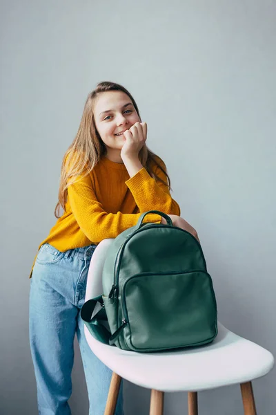 Teenage Girl Looks Camera Lean Hand White Modern Chair Leather Royalty Free Stock Photos