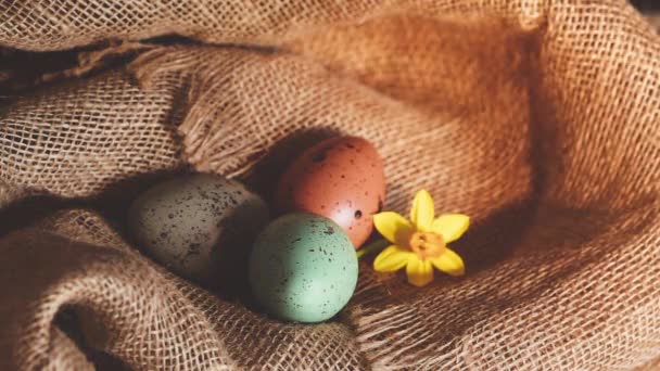 Easter eggs sackcloth background — Stock Video