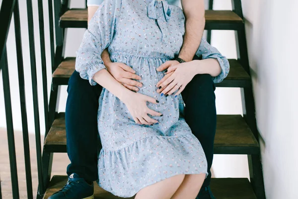 Pregnant Woman Her Husband Sitting Stair Hugging Belly — Stock Photo, Image