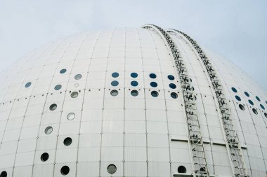 Close-up photo of Ericsson Globe in Stockholm. Modern architecture concept clipart