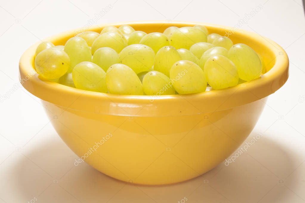Grapes in a yellow bowl
