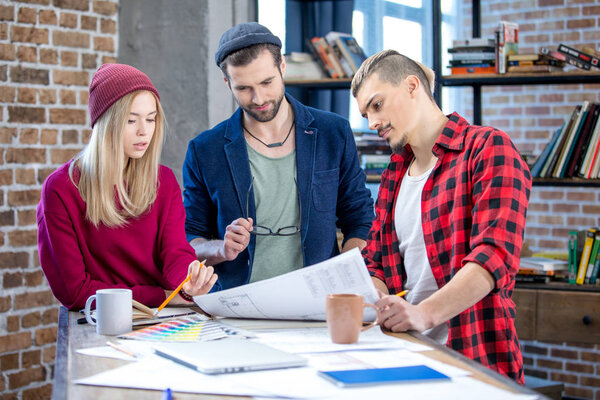 Designers working at project