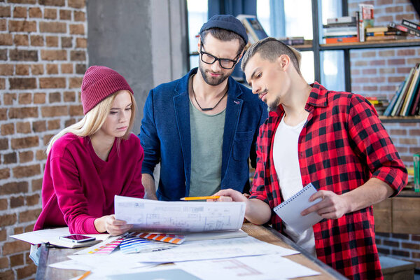 Designers working at project