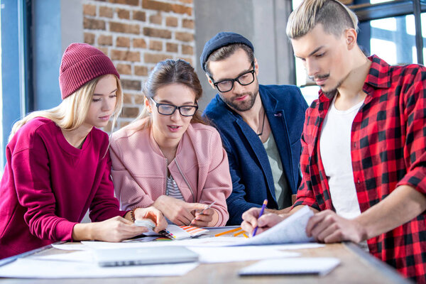 Designers working at project