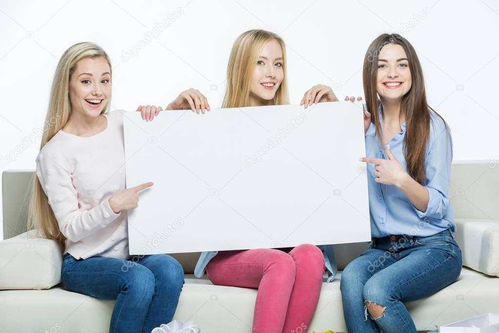 Women holding blank card 