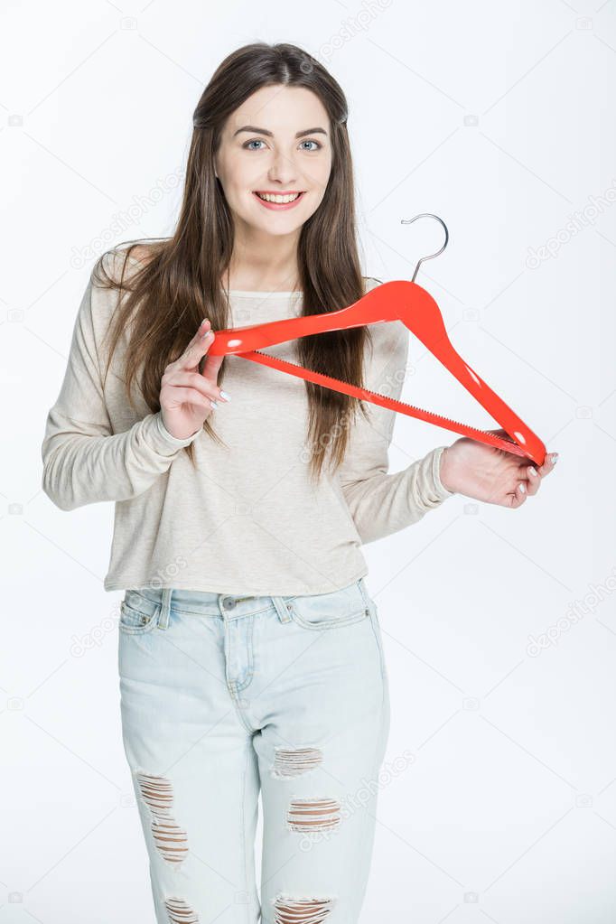 Woman holding hanger