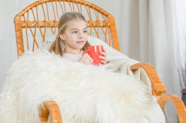 Girl in rocking chair  clipart