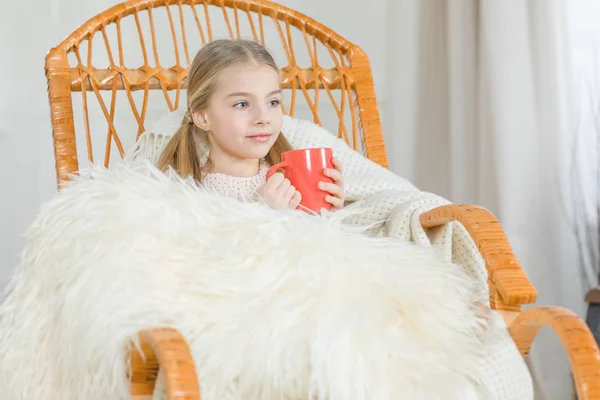 Girl in rocking chair — Stock Photo, Image