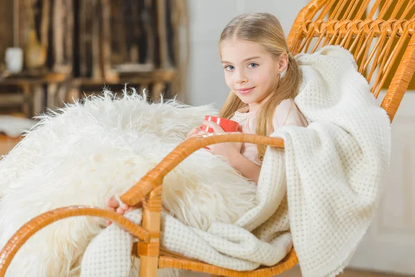 Girl in rocking chair — Stock Photo, Image