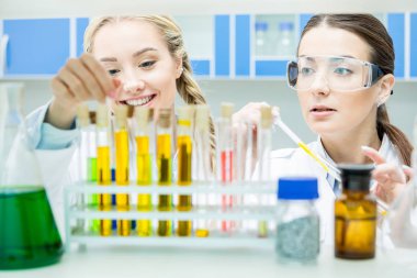 Female scientists in lab clipart