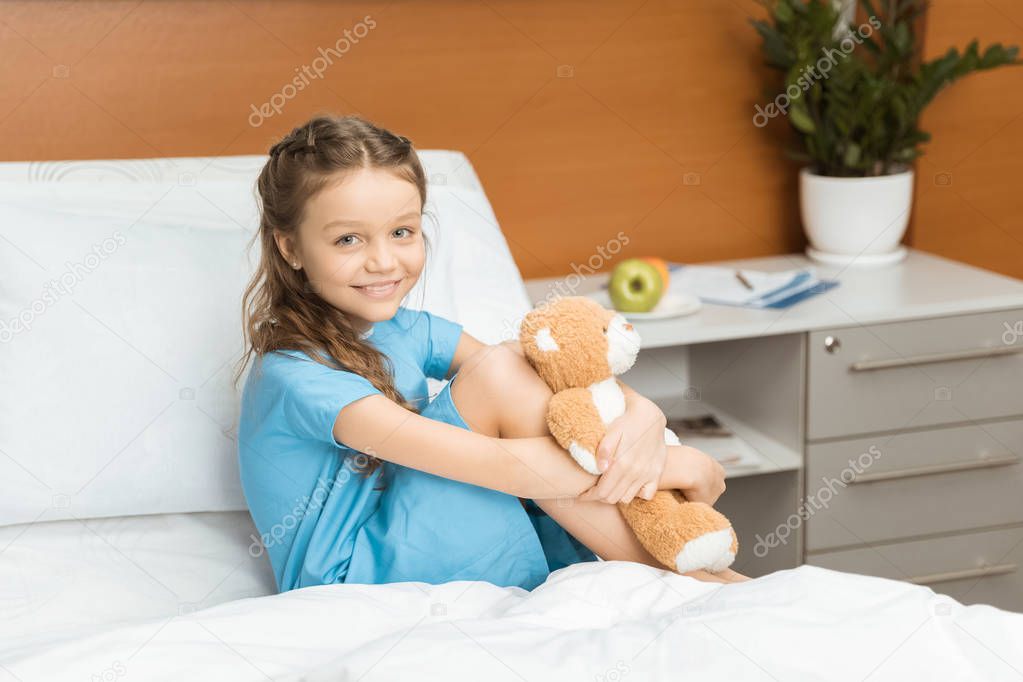 Little patient with teddy bear