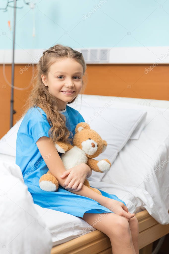Little patient with teddy bear 