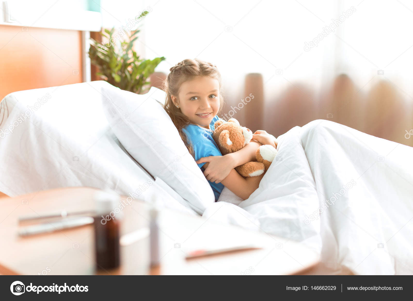 Little girl in hospital bed Stock Photo by ©AndreyBezuglov 146662029