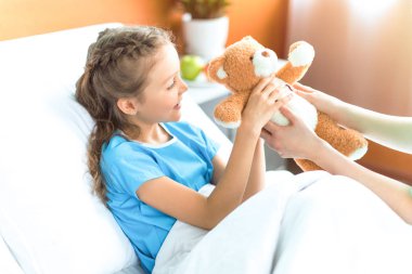 Girl and nurse in hospital clipart