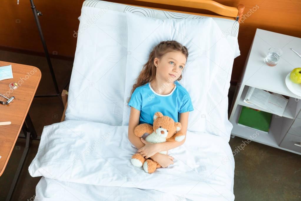 patient with teddy bear