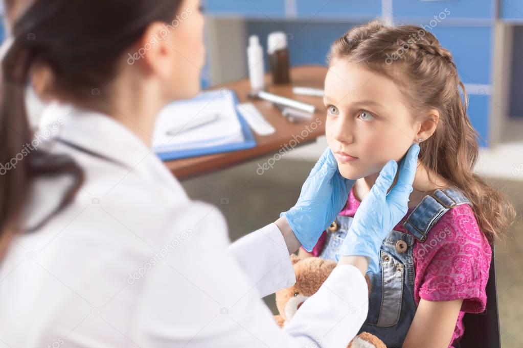 Little girl visiting doctor