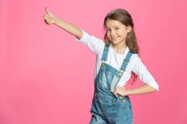 Girl showing thumb up  clipart
