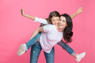 Mother and daughter hugging  clipart
