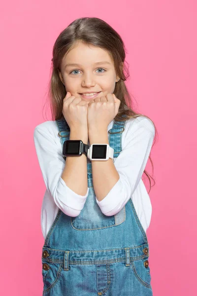 Little girl with smartwatches — Stock Photo, Image