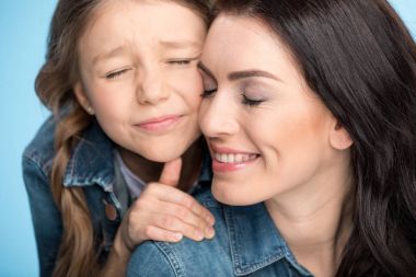 mother and daughter hugging clipart