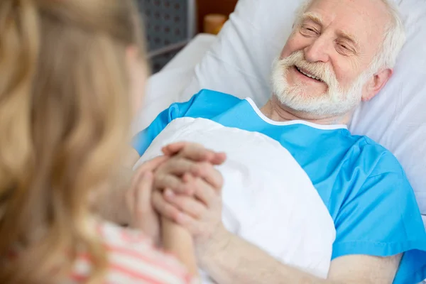 Grandfather and child holding hands — Stock Photo, Image