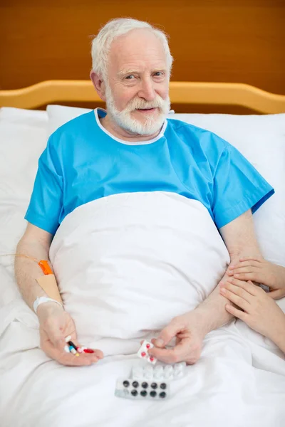 Senior man with pills — Stock Photo, Image