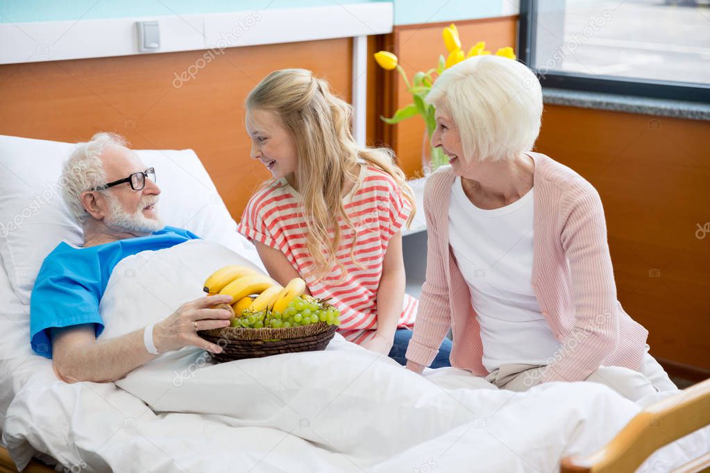 grandmother and granddaughter visiting patient  