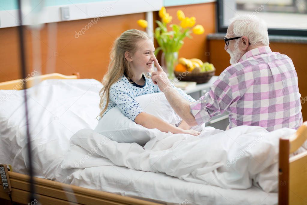 Grandfather and child in hospital 