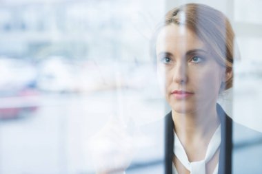 Pensive blonde businesswoman  clipart