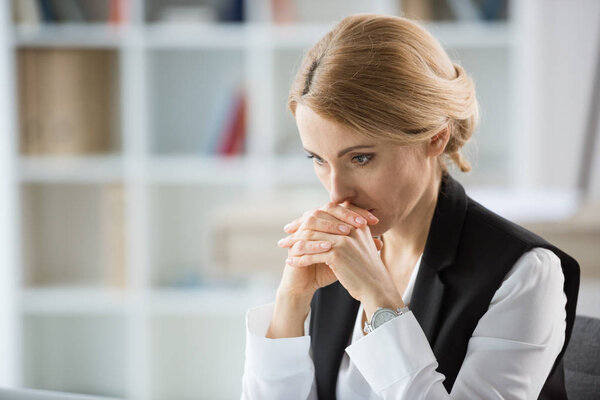 Pensive blonde businesswoman 