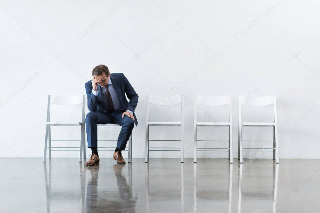 businessman sitting on chair