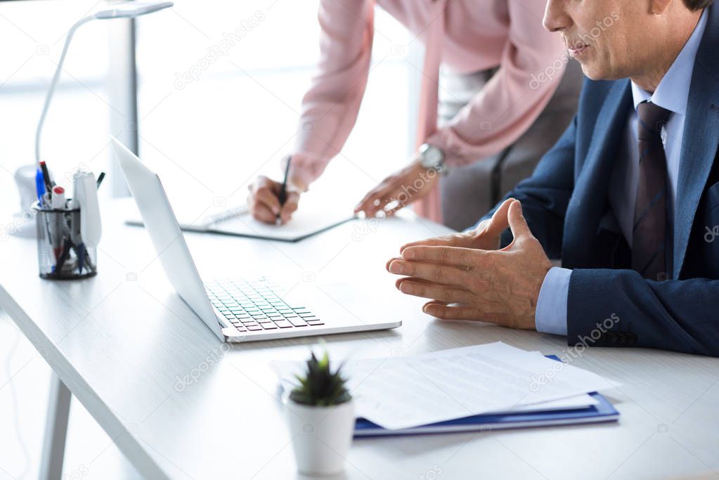businesspeople working in office