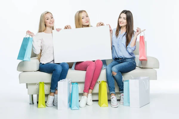 Women holding blank card — Stock Photo