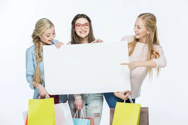 Women holding blank card — Stock Photo