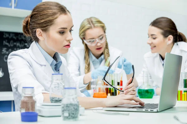 Scientist working on laptop — Stock Photo