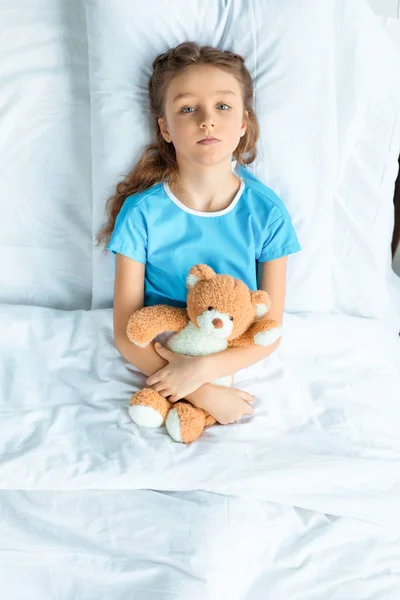 Patient with teddy bear — Stock Photo