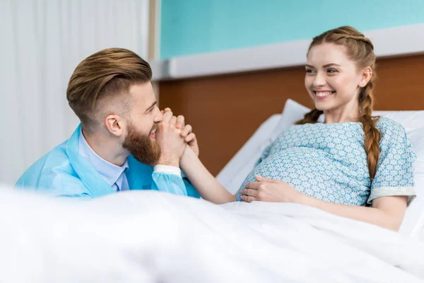 Pregnant woman with husband — Stock Photo