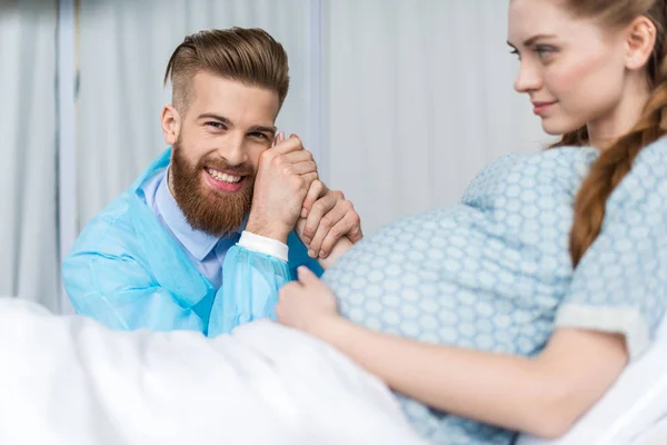 Pregnant woman with husband — Stock Photo