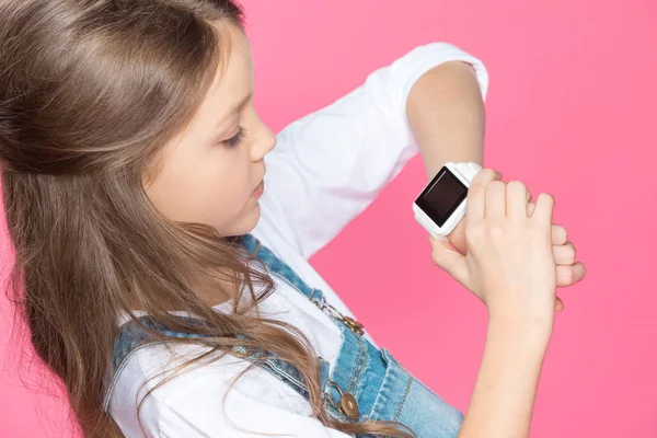 Little girl with smartwatch — Stock Photo