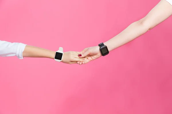 Mother and daughter with smartwatches — Stock Photo