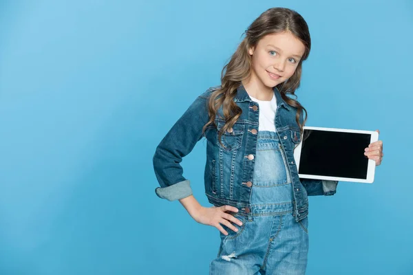 Girl holding digital tablet — Stock Photo