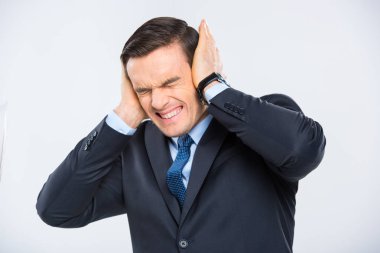 Businessman closing his ears clipart