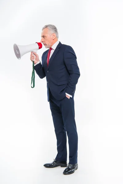 Businessman shouting in loudspeaker — Stock Photo, Image