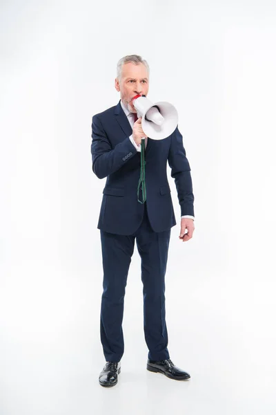 Businessman shouting in loudspeaker — Stock Photo, Image