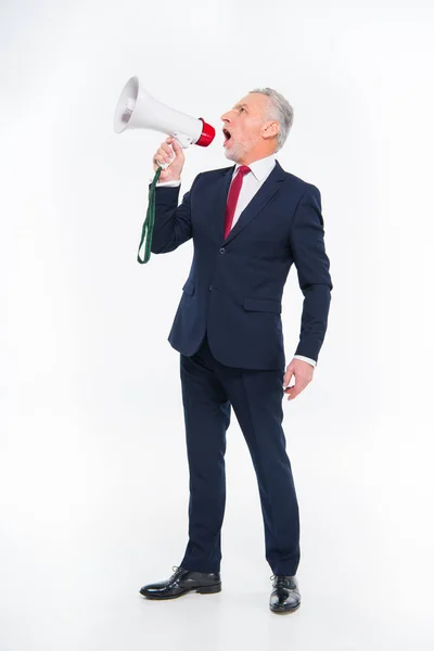 Businessman shouting in loudspeaker — Stock Photo, Image