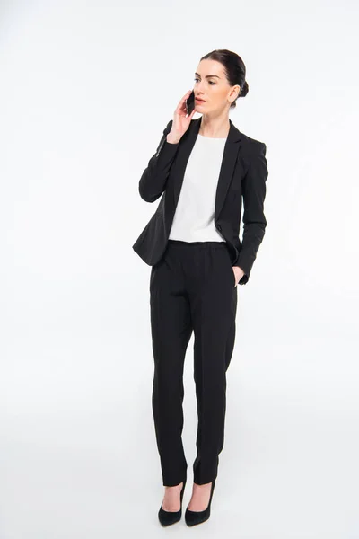 Businesswoman talking on smartphone — Stock Photo, Image