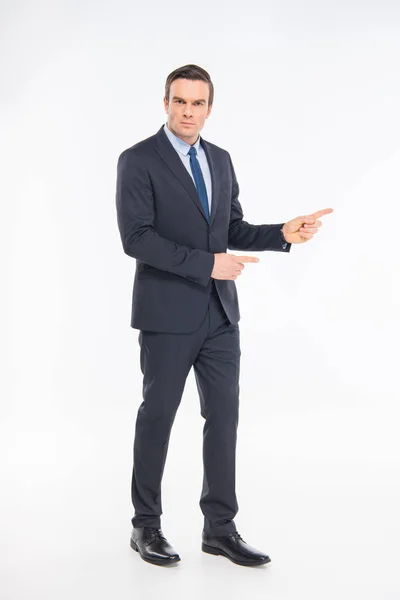 Professional businessman pointing — Stock Photo, Image