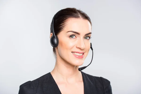 Young businesswoman in headset — Stock Photo, Image