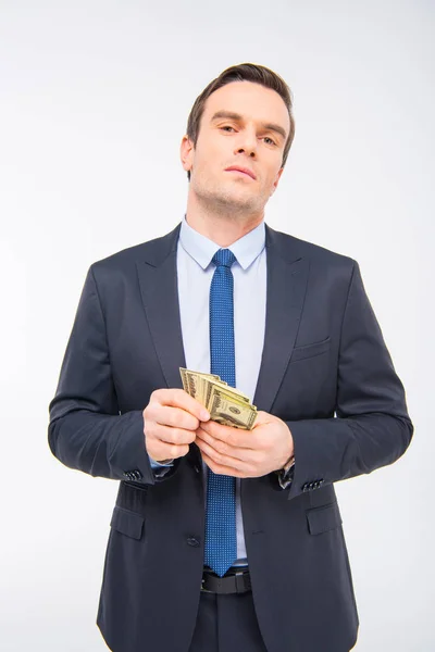 Young businessman with money — Free Stock Photo